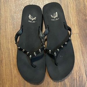 Yellow Box Flip Flops. Color: Black- suede straps w/ silver 3D skulls. Size: 10